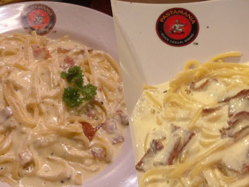 Two examples of how carbonara is served in one of Singapore's largest pasta chains.